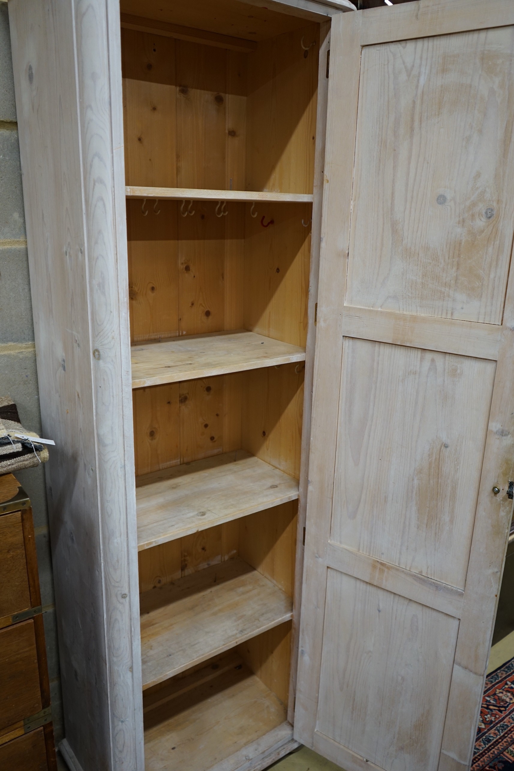 A Victorian style painted pine hall cupboard, width 59cm, depth 37cm, height 183cm